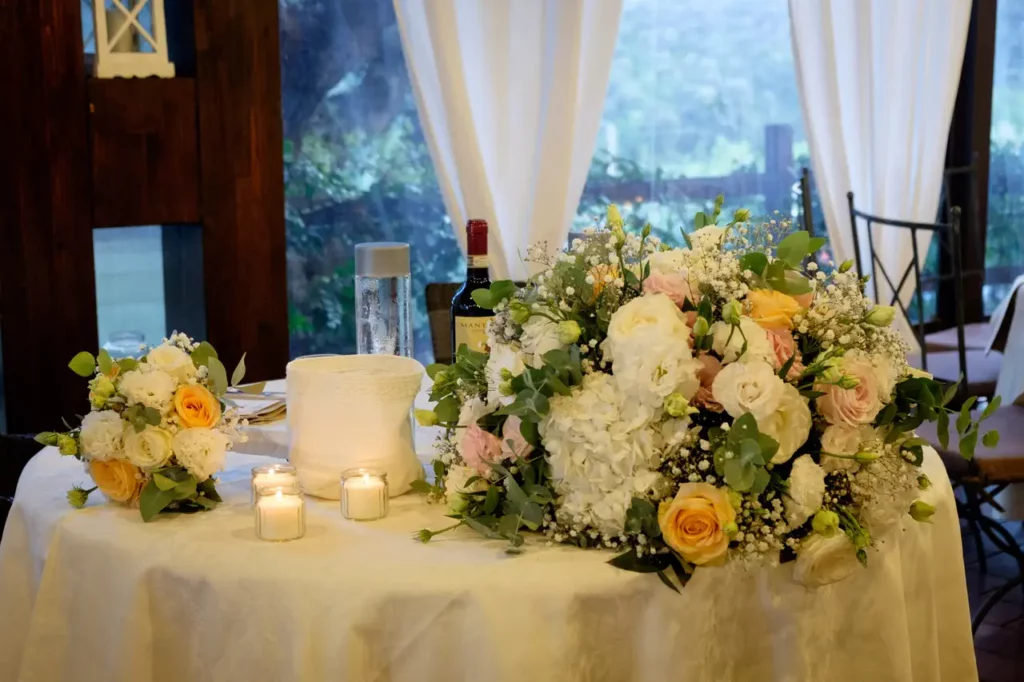 Table of the bride and groom with floral decorations